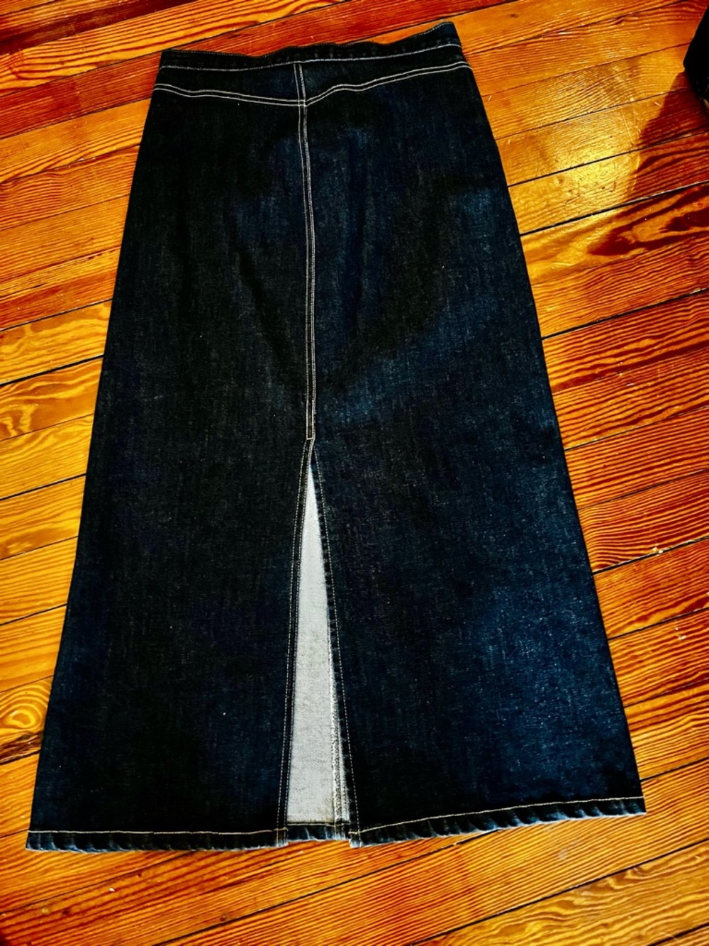 Dark Wash Midi Denim Skirt with back slit.